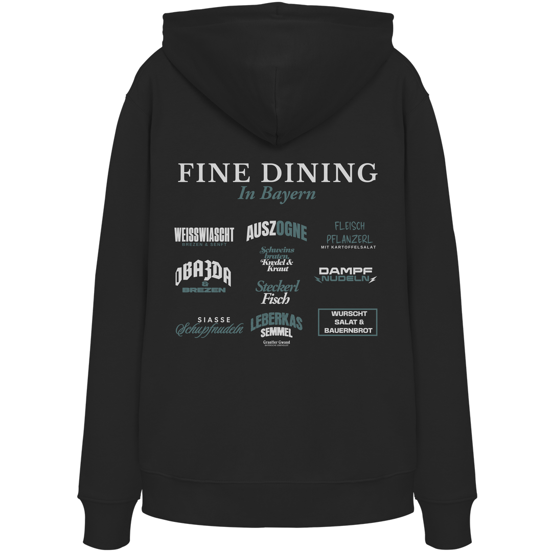 Schwarzer Hoodie mit großem Backprint "Fine Dining in Bayern" und verschiedenen bayerischen Spezialitäten wie Weißwiascht, Obazda, Auszogne, Steckerlfisch und Leberkas von Grantler Gwand.