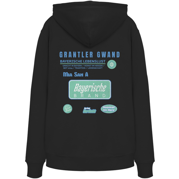 Schwarzer Hoodie mit großem Grantler Gwand Backprint, blau-grünem „Bayerische Brand“-Schriftzug und moderner bayerischer Streetwear-Grafik.
