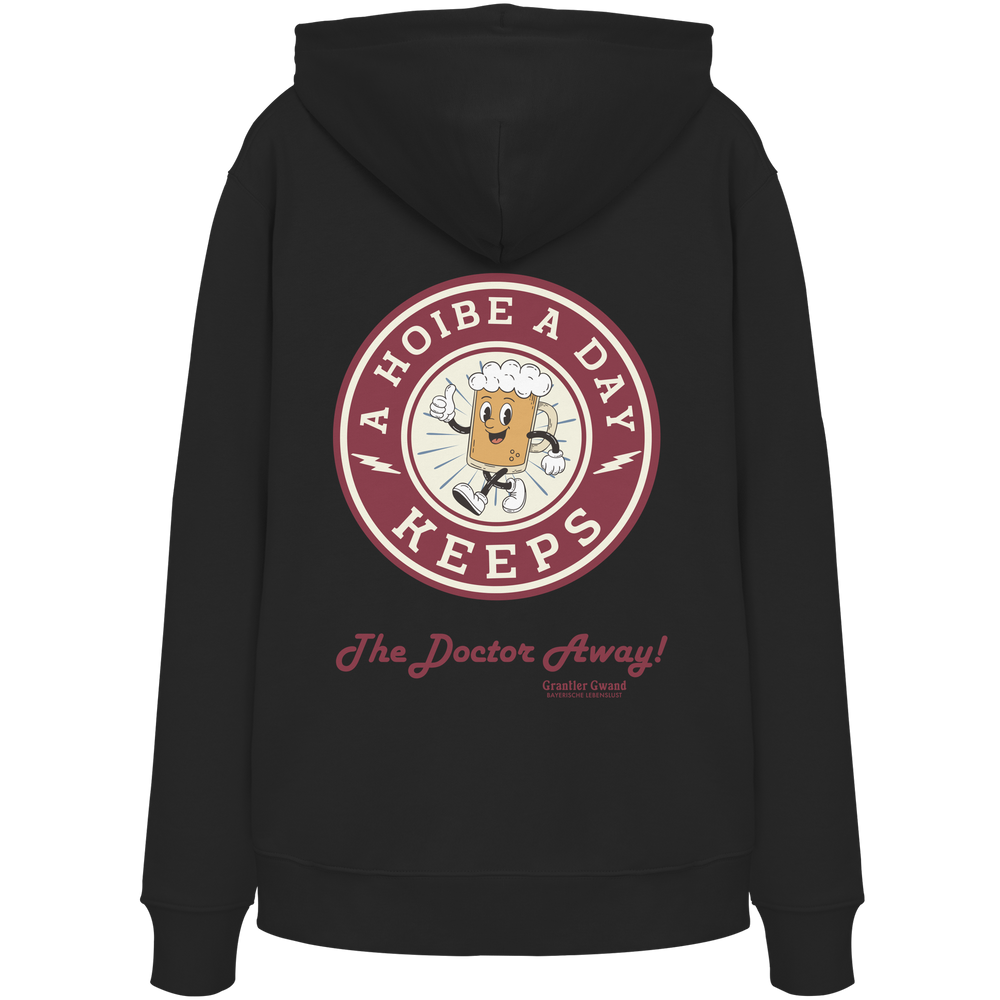 Schwarzer Unisex-Hoodie mit großem Backprint „A Hoibe A Day – Keeps the Doctor Away“ im Retro-Bierdeckel-Design. Bequemer Kapuzenhoodie für Biergarten, Volksfest und bayerische Streetwear. Hochwertig verarbeitet, designed und bedruckt in Bayern von Grantler Gwand.