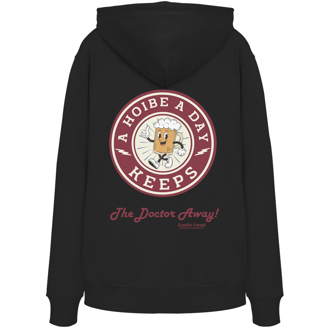 Schwarzer Unisex-Hoodie mit großem Backprint „A Hoibe A Day – Keeps the Doctor Away“ im Retro-Bierdeckel-Design. Bequemer Kapuzenhoodie für Biergarten, Volksfest und bayerische Streetwear. Hochwertig verarbeitet, designed und bedruckt in Bayern von Grantler Gwand.