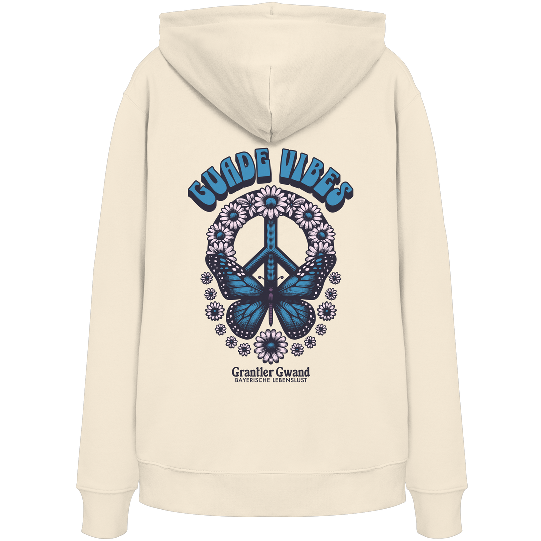 Cremefarbener Oversize Hoodie mit großem Backprint aus Peace-Zeichen, Schmetterling und Blumen sowie „Guade Vibes“ Schriftzug – hochwertiger Bio-Baumwoll Hoodie im bayerischen Streetwear-Style von Grantler Gwand.