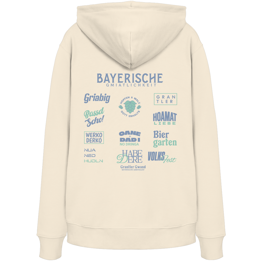 Beiger Bayerische Gmiatlichkeit Hoodie mit großem grünem Backprint und typischen bayerischen Begriffen wie Hoamatliebe, Biergarten, Grantler und Hopfen &amp; Malz. Unisex Kapuzenhoodie im modernen Streetwear-Look für Freizeit, Volksfest und Biergarten. Designed und bedruckt in Bayern von Grantler Gwand.