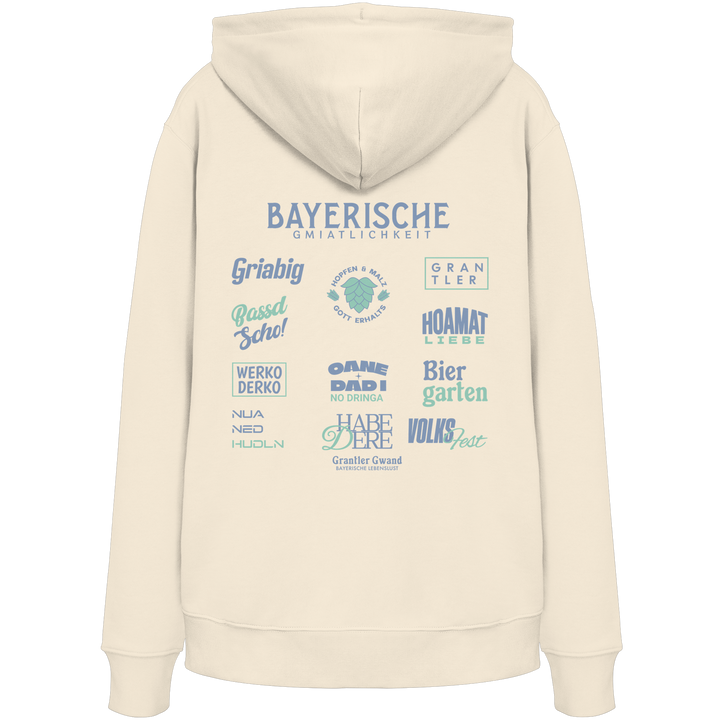 Beiger Bayerische Gmiatlichkeit Hoodie mit großem grünem Backprint und typischen bayerischen Begriffen wie Hoamatliebe, Biergarten, Grantler und Hopfen &amp; Malz. Unisex Kapuzenhoodie im modernen Streetwear-Look für Freizeit, Volksfest und Biergarten. Designed und bedruckt in Bayern von Grantler Gwand.
