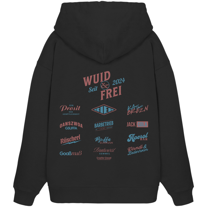 Schwarzer Oversize Hoodie mit großem Backprint „Wuid &amp; Frei“ sowie verschiedenen bayerischen Begriffen wie Prosit der Gemütlichkeit, Oanszwoa Gsuffa, Jack Cola, Aperol Bar und Dirndl &amp; Lederhosn von Grantler Gwand.