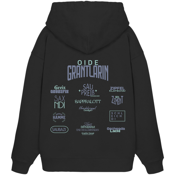 Schwarzer Oversize Hoodie mit großem Backprint „Oide Grantlarin“ sowie verschiedenen bayerischen Dialektbegriffen wie Sapperlott, Saubazi, Saxndi und Gscheada Lackl von Grantler Gwand.