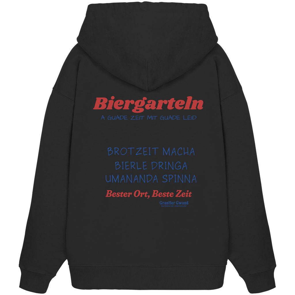 Schwarzer Oversize Hoodie mit großem Biergarteln Backprint in Rot und Blau sowie bayerischem Statement „A guade Zeit mit guade Leid“ – extra schwerer Premium Hoodie für Biergarten, Volksfest und moderne bayerische Streetwear von Grantler Gwand.