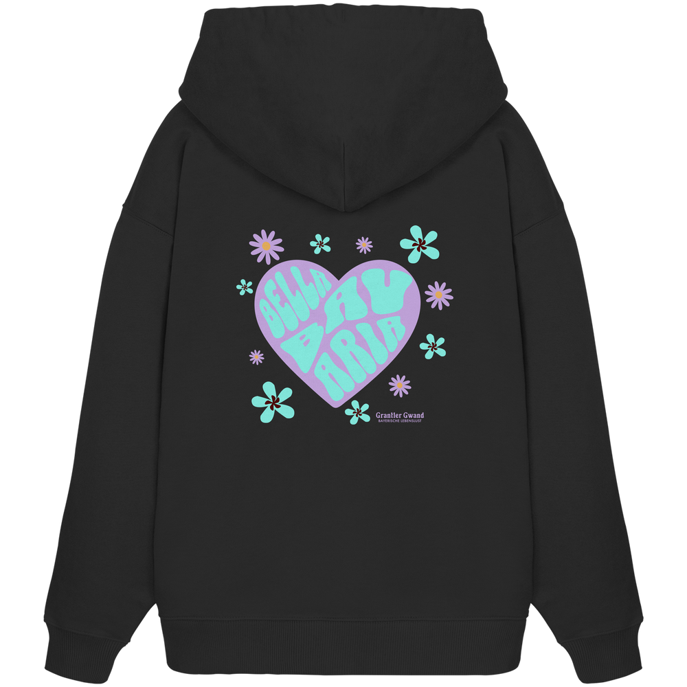 schwarzer Oversize Hoodie mit großem Herz-Backprint in Lila und Mint, floralen Elementen und dem Schriftzug „Bavarian Maria“ im Retro-Stil. Designed & bedruckt in Bayern.