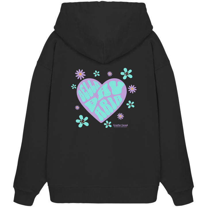 schwarzer Oversize Hoodie mit großem Herz-Backprint in Lila und Mint, floralen Elementen und dem Schriftzug „Bavarian Maria“ im Retro-Stil. Designed &amp; bedruckt in Bayern.