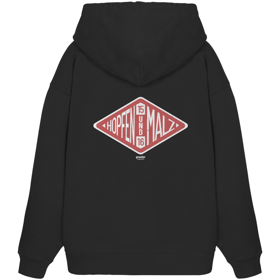 Schwarzer Oversize Hoodie mit großem roten Rauten-Backprint und dem Schriftzug „Hopfen und Malz 1516“ im Vintage-Design.