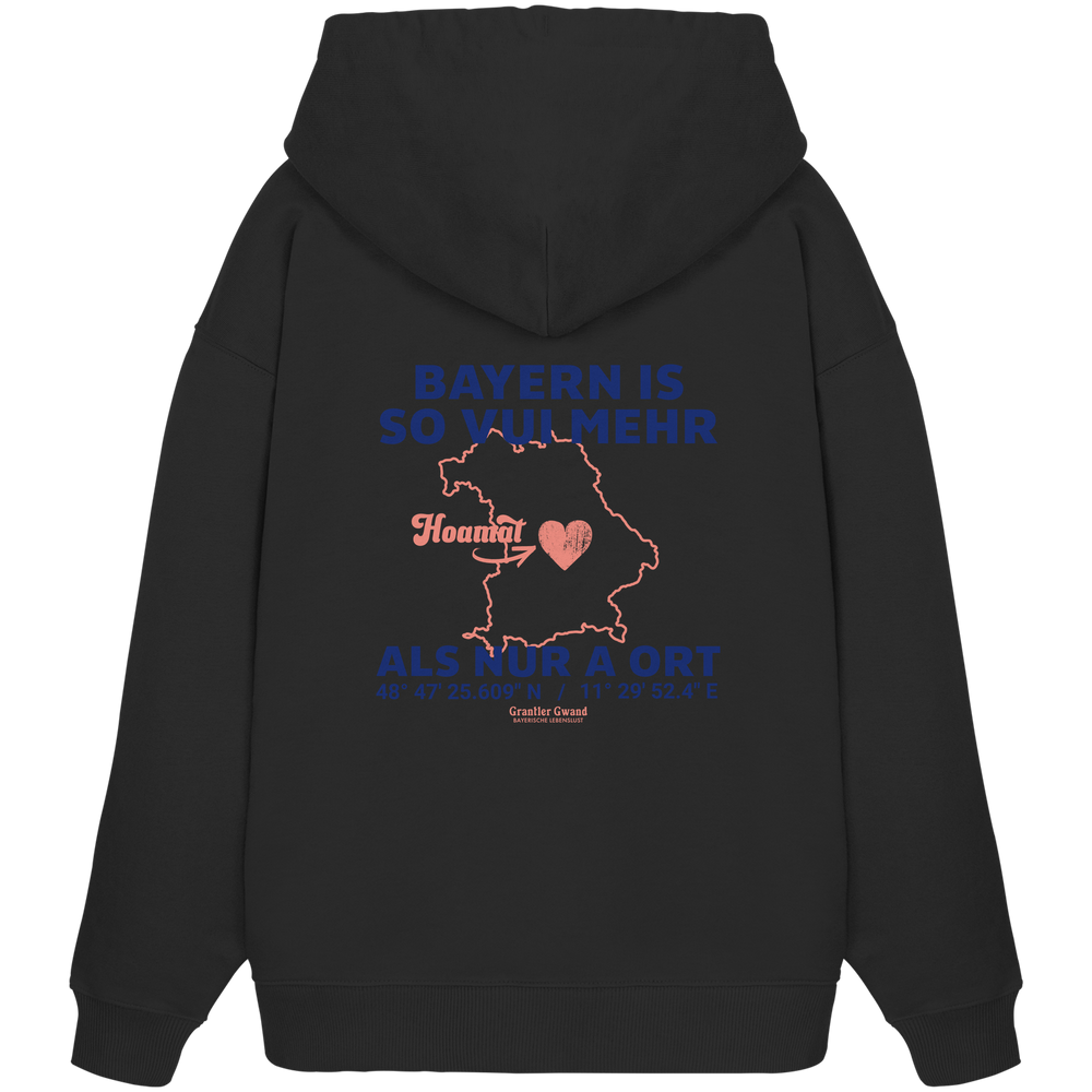 Schwarzer Oversize Hoodie von Grantler Gwand mit blauem Backprint „Bayern is so vui mehr als nur a Ort“, Herzsymbol und Bayern-Silhouette – bayerischer Streetwear Hoodie.