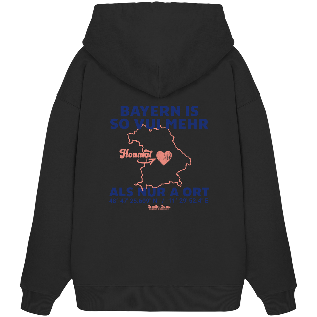 Schwarzer Oversize Hoodie von Grantler Gwand mit blauem Backprint „Bayern is so vui mehr als nur a Ort“, Herzsymbol und Bayern-Silhouette – bayerischer Streetwear Hoodie.