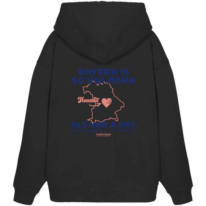 Schwarzer Oversize Hoodie von Grantler Gwand mit blauem Backprint „Bayern is so vui mehr als nur a Ort“, Herzsymbol und Bayern-Silhouette – bayerischer Streetwear Hoodie.