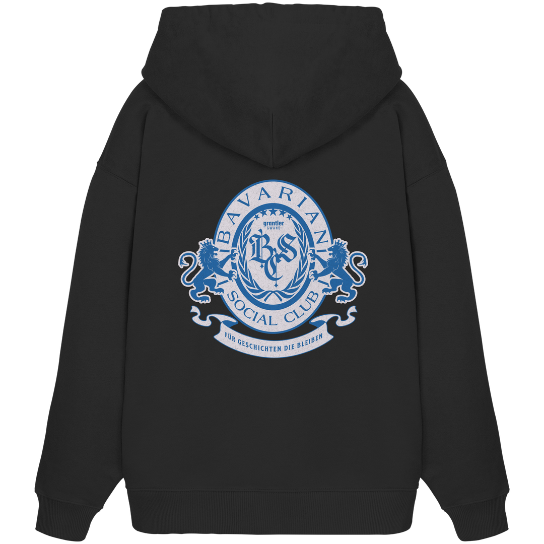 schwarzer Oversize Hoodie mit großem blauen Bavarian Social Club Wappen auf dem Rücken, Lorbeerkranz, Löwen und hochwertigem bayerischen Streetwear-Design.