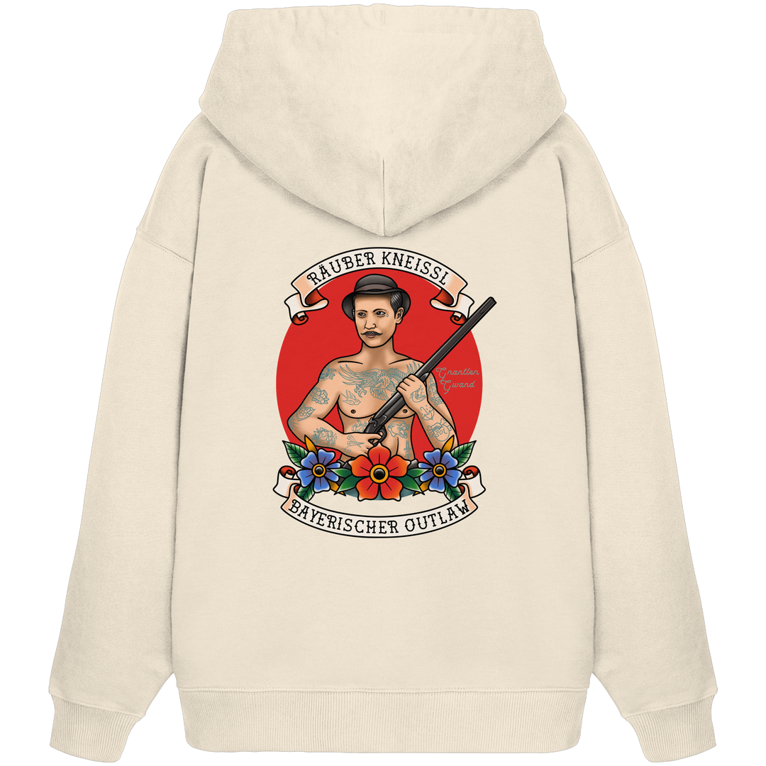 Beiger Oversize Hoodie mit großem Räuber Kneissl Backprint im Tattoo-Style. Extra schwerer Premium Hoodie mit bayerischem Motiv für moderne Streetwear, Festival, Alltag und urbanen Look. Designed und bedruckt in Bayern von Grantler Gwand.