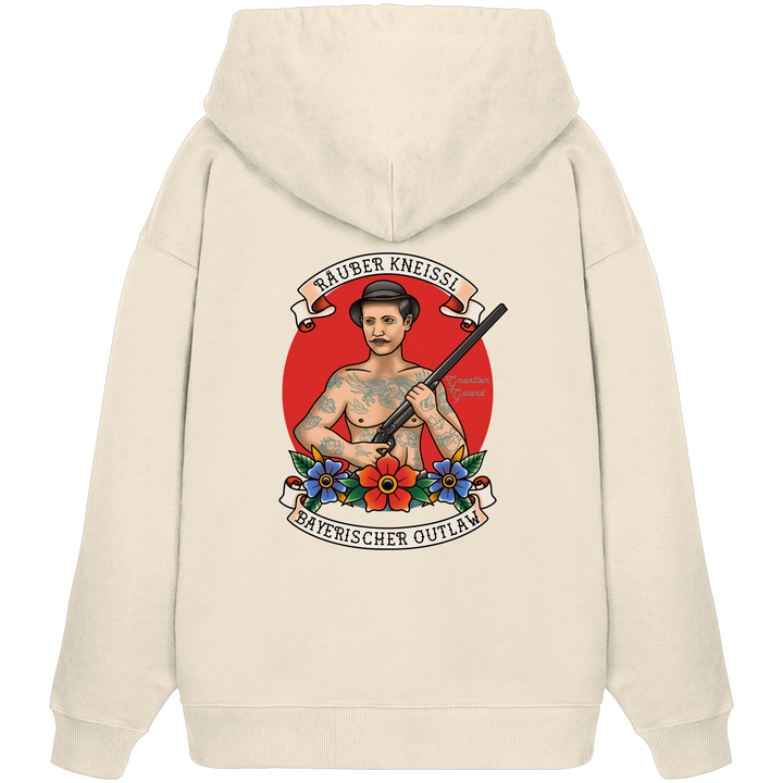 Beiger Oversize Hoodie mit großem Räuber Kneissl Backprint im Tattoo-Style. Extra schwerer Premium Hoodie mit bayerischem Motiv für moderne Streetwear, Festival, Alltag und urbanen Look. Designed und bedruckt in Bayern von Grantler Gwand.