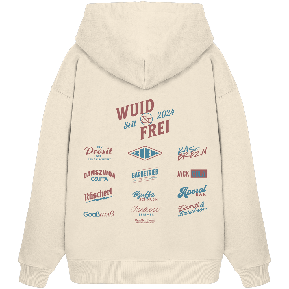 Naturfarbener Oversize Hoodie mit großem Backprint „Wuid & Frei“ sowie verschiedenen bayerischen Begriffen wie Prosit der Gemütlichkeit, Oanszwoa Gsuffa, Jack Cola, Aperol Bar und Dirndl & Lederhosn von Grantler Gwand.