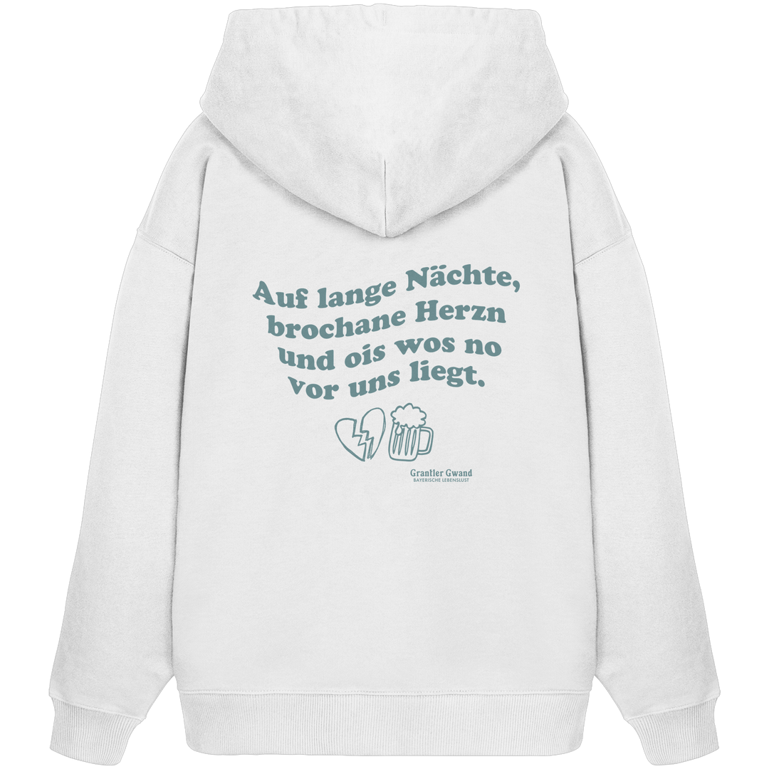 Weißer, schwerer Oversize Hoodie mit grünem Rückendruck „auf lange Nächte“ im Vintage-Look von Grantler Gwand aus hochwertiger Bio-Baumwolle.