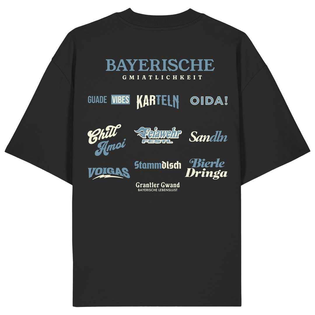 Schwarzer Oversize Shirt mit großem Backprint "Bayerische Gmiatlichkeit" und verschiedenen bayerischen Begriffen wie Oida, Karteln, Stammdisch und Bierle Dringa von Grantler Gwand.