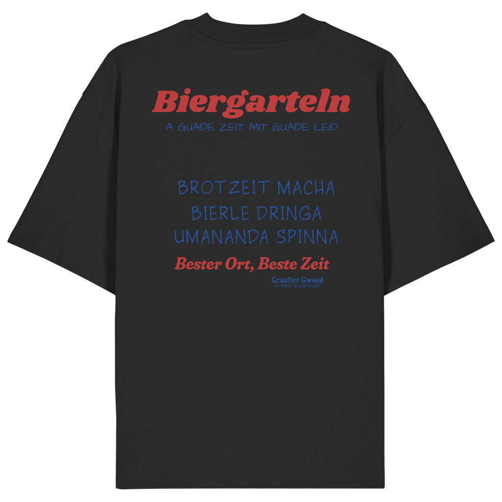 Schwarzes Oversize Unisex T-Shirt mit großem Biergarteln Backprint in Rot und bayerischem Statement „A guade Zeit mit guade Leid“. Schweres Premium-Shirt für Biergarten, Volksfest, Stammtisch und moderne bayerische Streetwear. Designed und bedruckt in Bayern von Grantler Gwand.