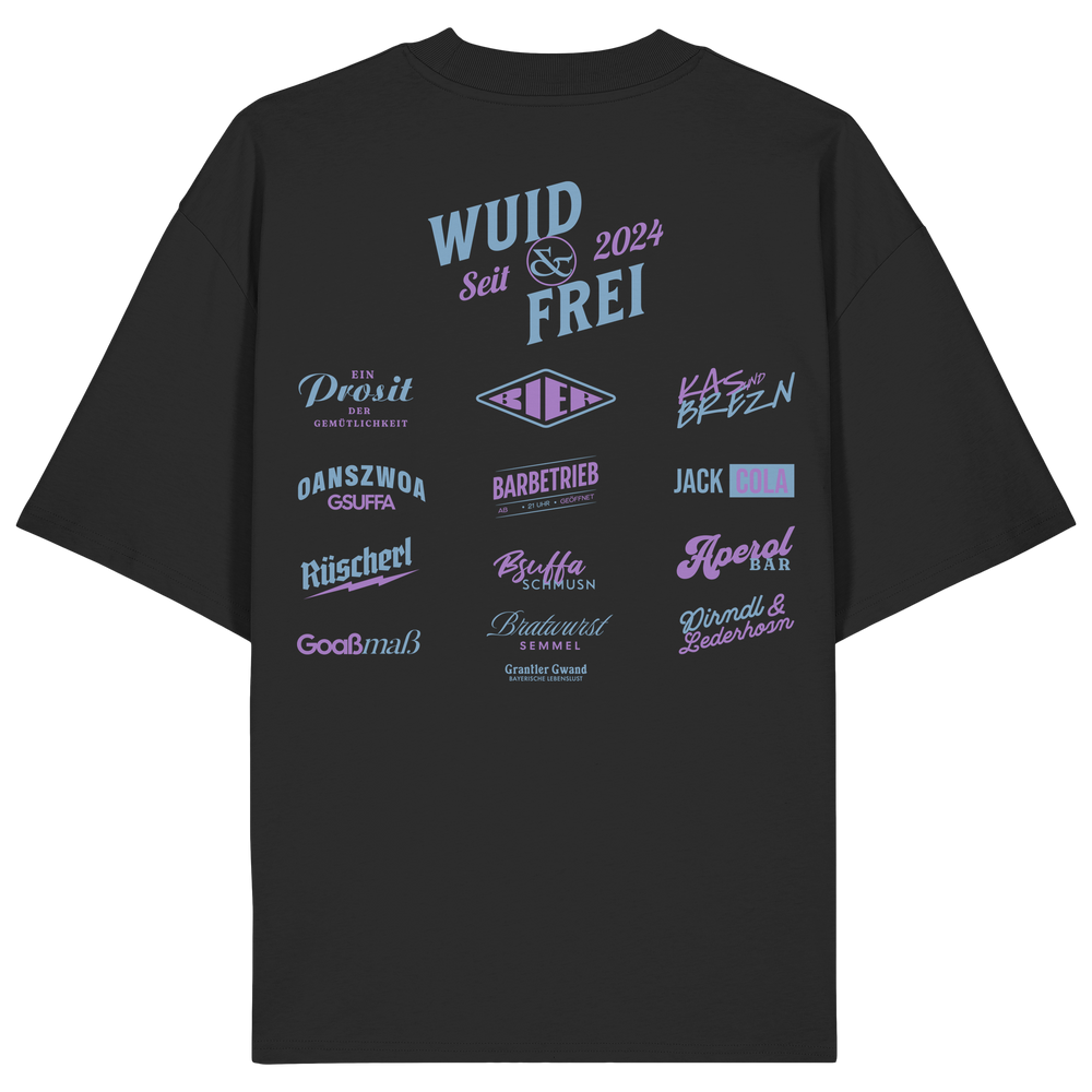 Schwarzes oversize Shirt mit großem Backprint „Wuid & Frei seit 2024“ sowie verschiedenen bayerischen Typografie-Designs und Dialektbegriffen.