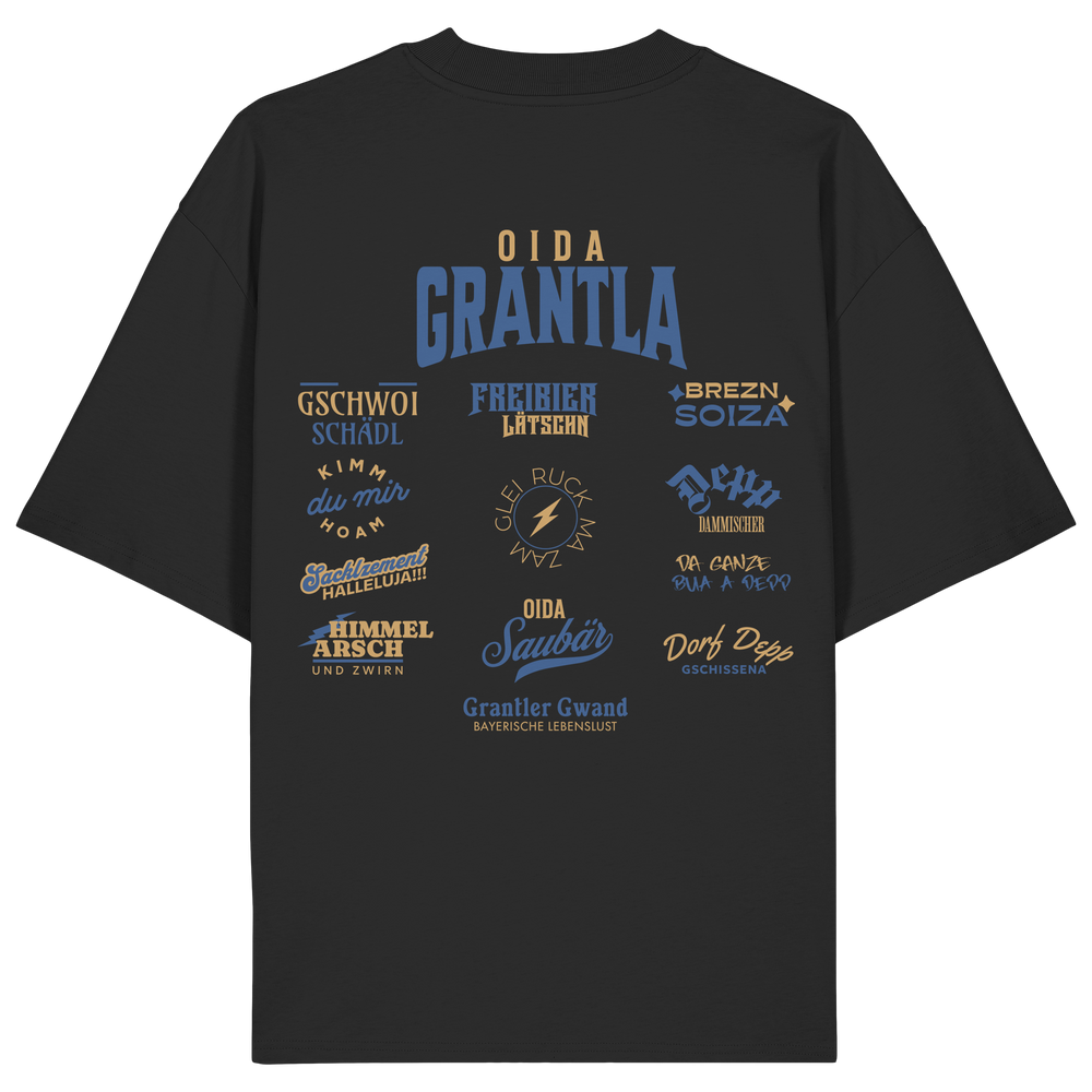 Schwarzes Oversize Shirt mit großem Backprint „Oida Grantla“ und verschiedenen bayerischen Dialektbegriffen wie Gschwoi Schädl, Freibier Låtschn, Brezn Soiza, Oida Saubär und Dorf Depp von Grantler Gwand.