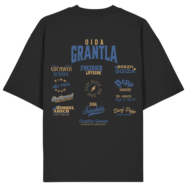 Schwarzes Oversize Shirt mit großem Backprint „Oida Grantla“ und verschiedenen bayerischen Dialektbegriffen wie Gschwoi Schädl, Freibier Låtschn, Brezn Soiza, Oida Saubär und Dorf Depp von Grantler Gwand.