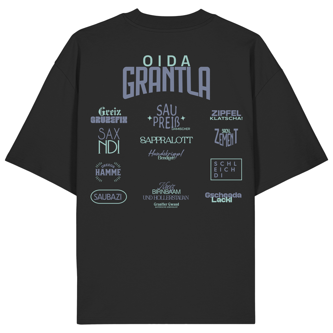 Schwarzes oversize Shirt mit großem Backprint „Oida Grantla“ und verschiedenen bayerischen Dialektbegriffen wie Saupreis, Saxnidi, Zipfelklatscha und Schleich di von Grantler Gwand.