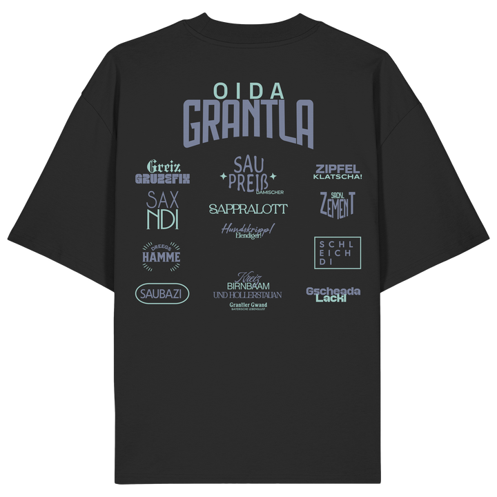 Schwarzes oversize Shirt mit großem Backprint „Oida Grantla“ und verschiedenen bayerischen Dialektbegriffen wie Saupreis, Saxnidi, Zipfelklatscha und Schleich di von Grantler Gwand.