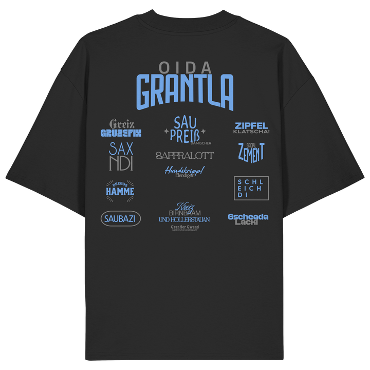 Schwarzes oversize Shirt mit großem Backprint „Oida Grantla“ und verschiedenen bayerischen Dialektbegriffen wie Saupreis, Saxnidi, Zipfelklatscha und Schleich di von Grantler Gwand.