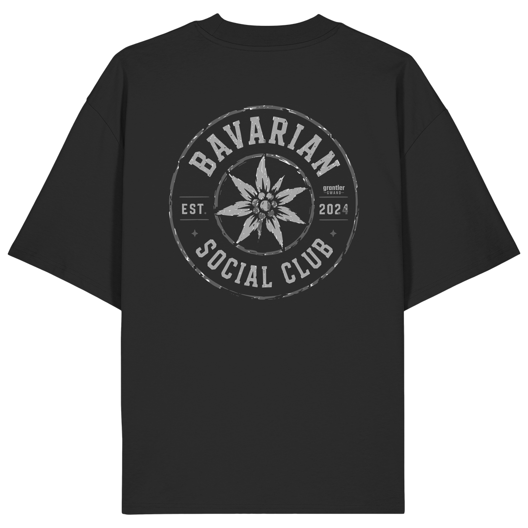 Schwarzes Oversize T-Shirt mit großem grauen Bavarian Social Club Backprint und Edelweiß-Motiv im Vintage-Stil.