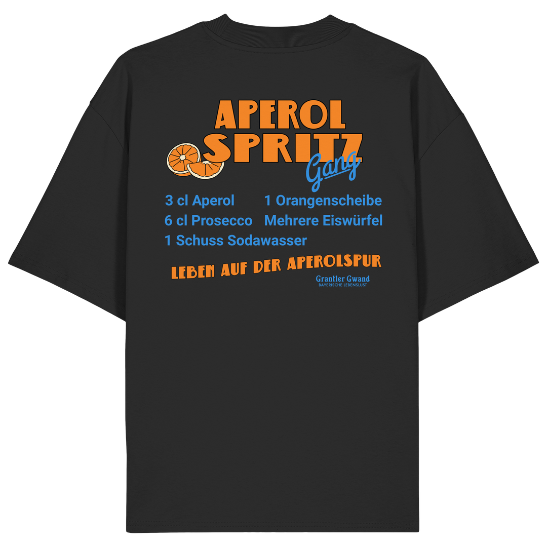 Schwarzes Oversize T-Shirt mit großem Aperol Spritz Gang Backprint im Retro-Design mit Cocktail-Rezept. Hochwertiges Heavy Premium-Shirt für Sommer, Biergarten, Festival, Urlaub und moderne Streetwear. Designed und bedruckt in Bayern von Grantler Gwand.