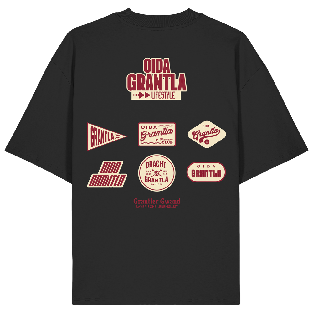 Schwarzes Oversize Shirt mit großem Oida Grantla Lifestyle Backprint aus mehreren Retro-Logos im bayerischen Streetwear-Design von Grantler Gwand.