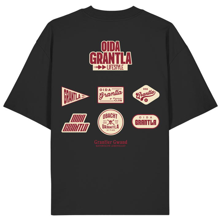 Schwarzes Oversize Shirt mit großem Oida Grantla Lifestyle Backprint aus mehreren Retro-Logos im bayerischen Streetwear-Design von Grantler Gwand.
