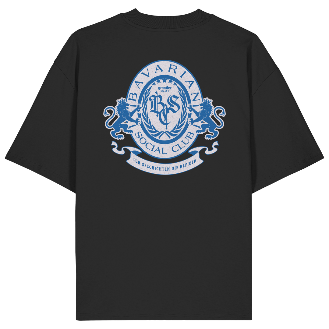 schwarzes Oversize T-Shirt mit großem blauen Bavarian Social Club Wappen auf dem Rücken, Lorbeerkranz, Löwen und hochwertigem bayerischen Streetwear-Design.