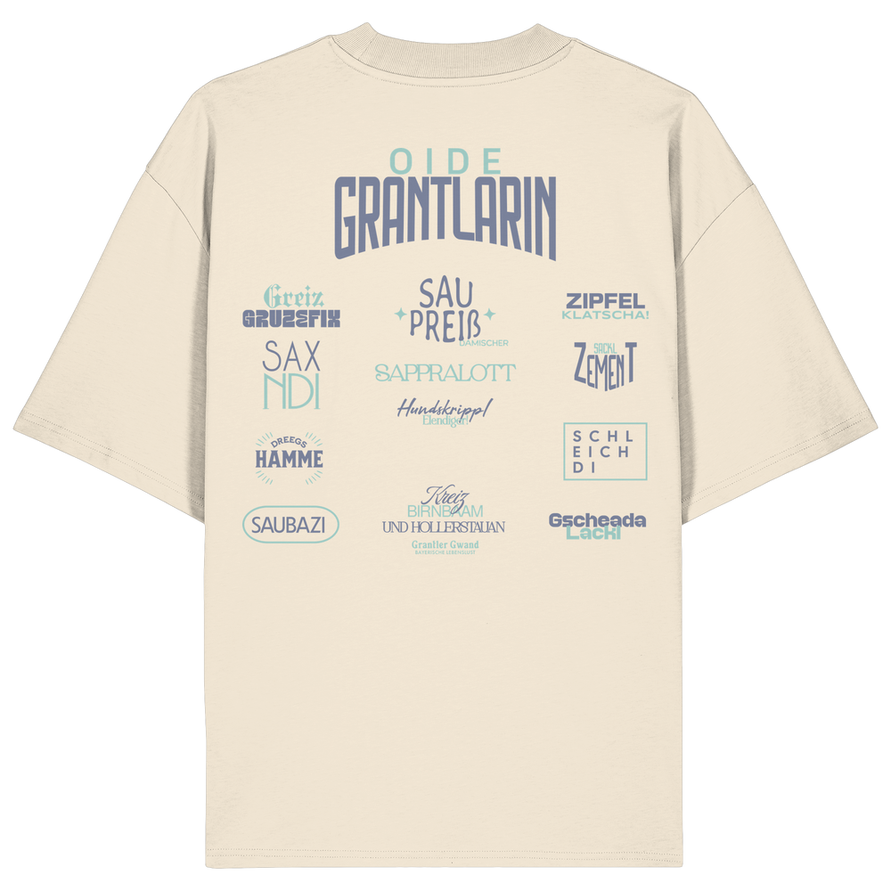 Naturfarbenes oversize Shirt mit großem Backprint „Oide Grantlarin“ sowie bayerischen Dialektbegriffen im modernen Typografie-Design von Grantler Gwand.