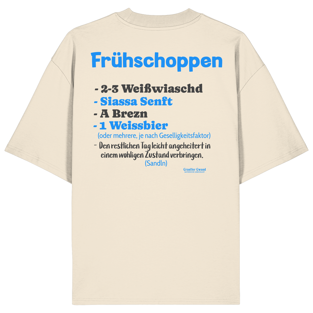 Naturfarbenes oversize Shirt mit großem Backprint „Frühschoppen“ und humorvoller bayerischer Anleitung zu Weißwurst, Brezn und Weißbier.