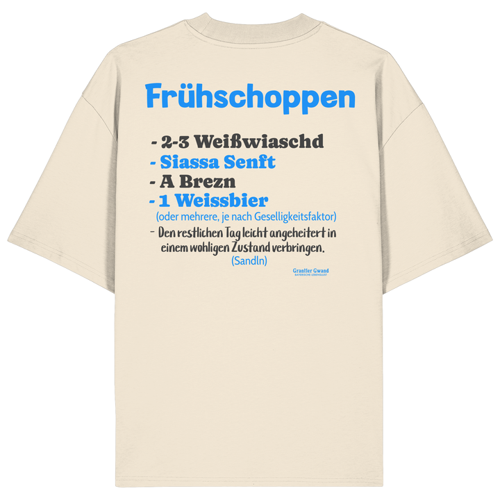 Naturfarbenes oversize Shirt mit großem Backprint „Frühschoppen“ und humorvoller bayerischer Anleitung zu Weißwurst, Brezn und Weißbier.