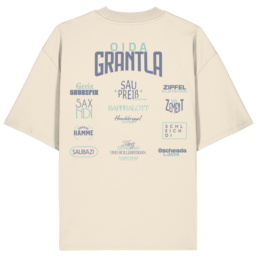Naturfarbenes oversize Shirt mit großem Backprint „Oida Grantla“ und verschiedenen bayerischen Dialektbegriffen wie Saupreis, Saxnidi, Zipfelklatscha und Schleich di von Grantler Gwand.