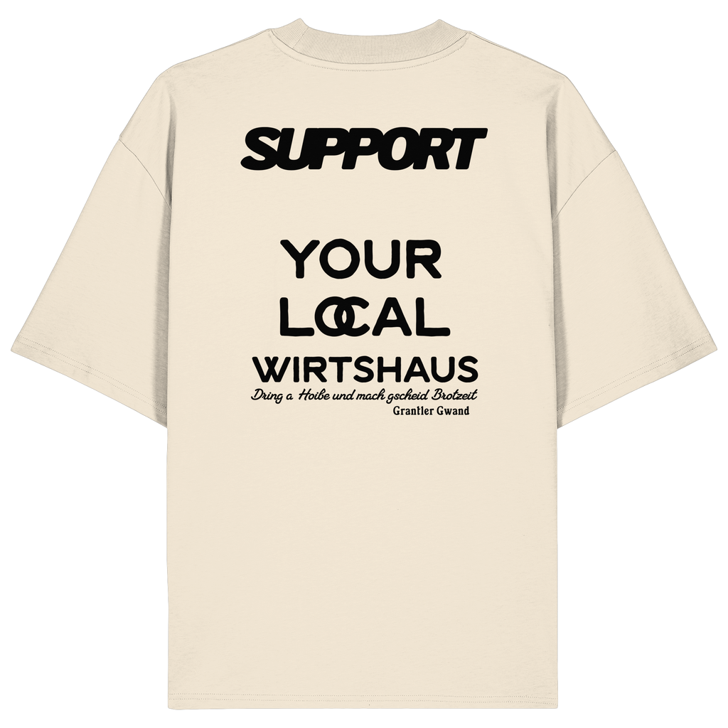 „Beiges Oversize T-Shirt mit schwarzem Backprint 'Support Your Local Wirtshaus' im markanten Typografie-Design von Grantler Gwand.“