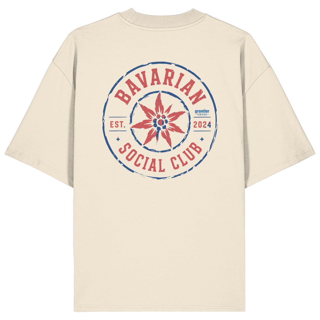 Naturfarbener Oversize T-Shirt mit großem roten und blauen „Bavarian Social Club“-Backprint und Edelweiß im Vintage-Streetwear-Design.