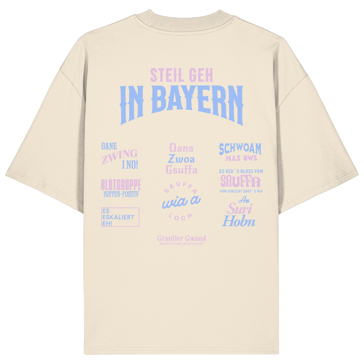 Naturfarbenes Oversize T-Shirt mit großem Backprint aus mehreren bayerischen Dialektsprüchen im modernen Typografie-Design von Grantler Gwand.