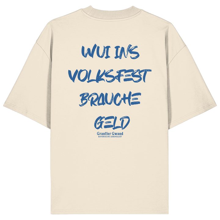 Cremfarbenes Oversize Shirt von Grantler Gwand mit blauem Backprint „Wui ins Volksfest – brauche Geld“ in markanter Brush-Schrift – bayerisches Streetwear Shirt aus Bio-Baumwolle.