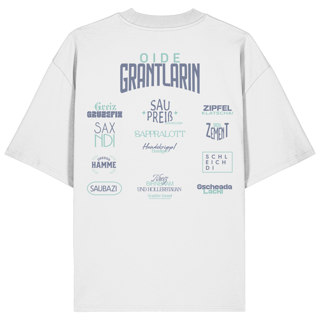 Weißes oversize Shirt mit großem Backprint „Oide Grantlarin“ sowie bayerischen Dialektbegriffen im modernen Typografie-Design von Grantler Gwand.