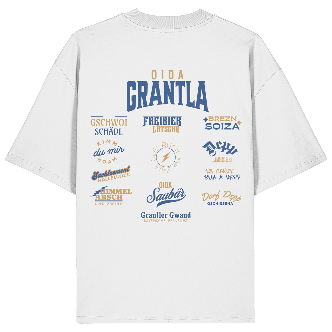 Weißes oversize Shirt mit großem Backprint „Oida Grantla“ und verschiedenen bayerischen Dialektbegriffen wie Gschwoi Schädl, Freibier Låtschn, Brezn Soiza, Oida Saubär und Dorf Depp von Grantler Gwand.