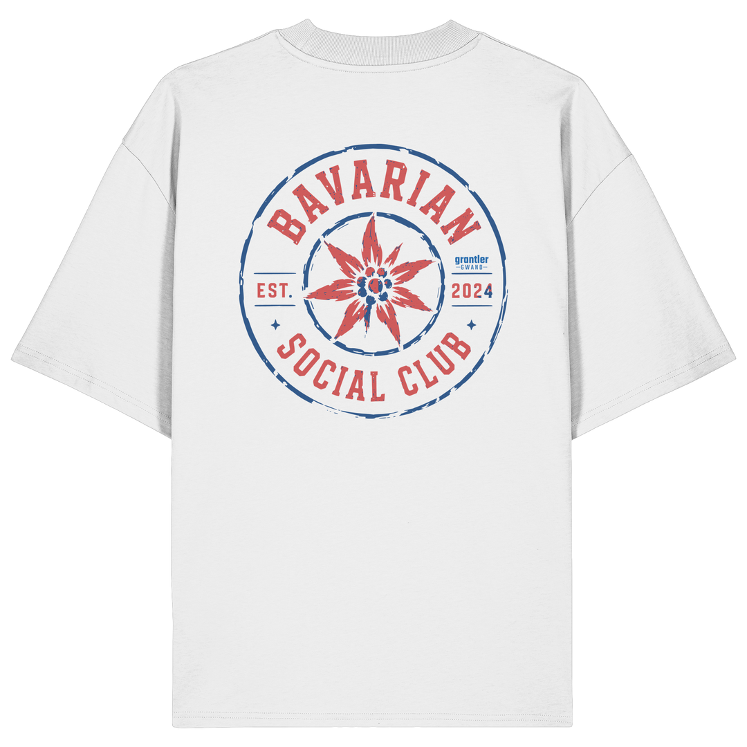 Weißes Oversize T-Shirt mit großem roten und blauen „Bavarian Social Club“-Backprint und Edelweiß im Vintage-Streetwear-Design.