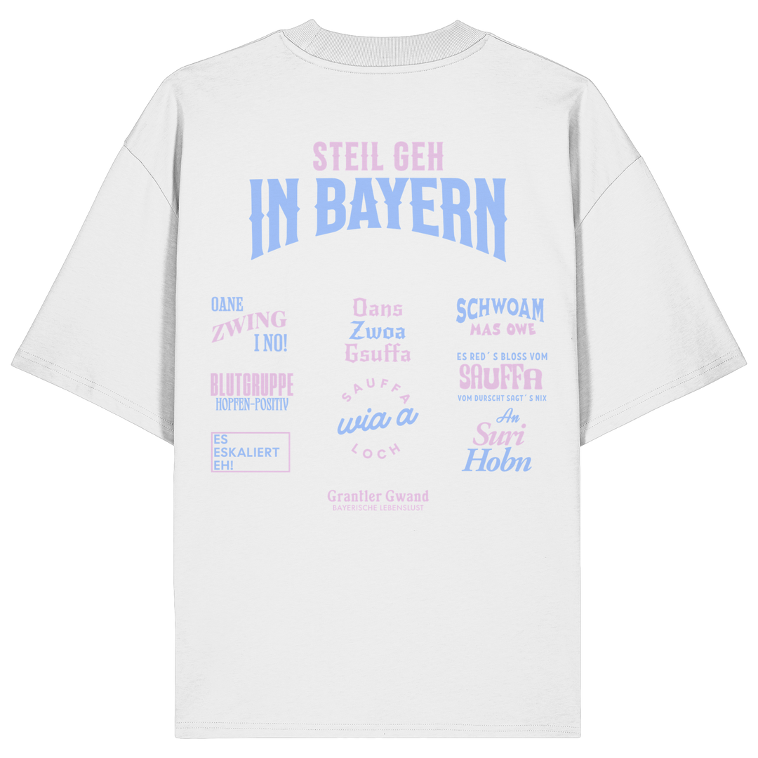 Weißes Oversize T-Shirt mit großem Backprint aus mehreren bayerischen Dialektsprüchen im modernen Typografie-Design von Grantler Gwand.