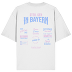 Weißes Oversize T-Shirt mit großem Backprint aus mehreren bayerischen Dialektsprüchen im modernen Typografie-Design von Grantler Gwand.