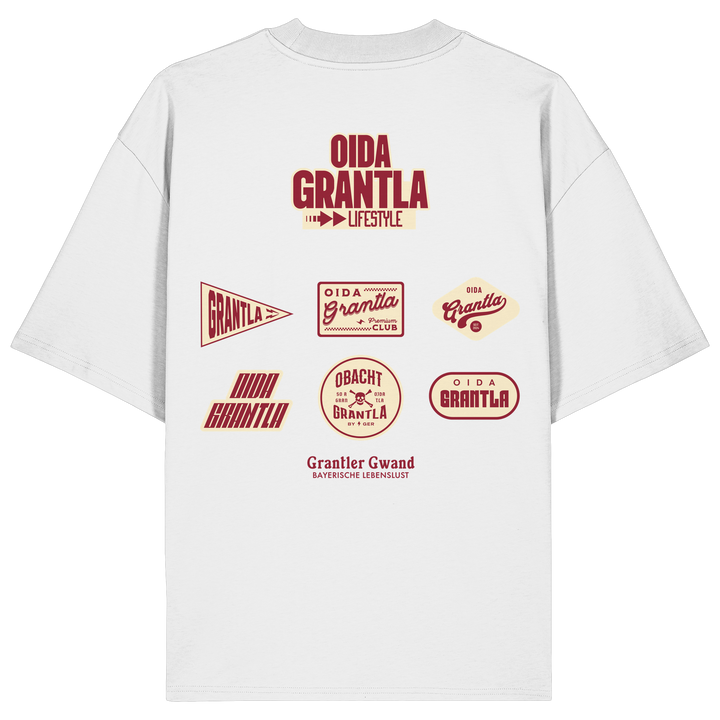 Weißes Oversize Shirt mit großem Oida Grantla Lifestyle Backprint aus mehreren Retro-Logos im bayerischen Streetwear-Design von Grantler Gwand.
