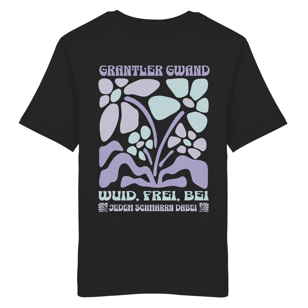 Schwarzes unisex Shirt mit großem Retro-Blumen-Backprint und dem bayerischen Schriftzug „Wuid, Frei, Bei Jedem Schmarrn Dabei“ von Grantler Gwand.