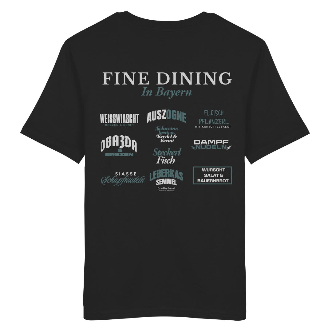 Schwarzes unisex Shirt mit großem Backprint "Fine Dining in Bayern" und verschiedenen bayerischen Spezialitäten wie Weißwiascht, Obazda, Auszogne, Steckerlfisch und Leberkas von Grantler Gwand.